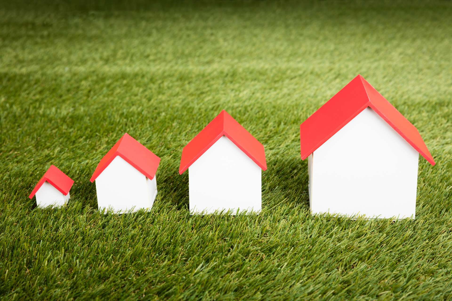 Model of houses on top of grass
