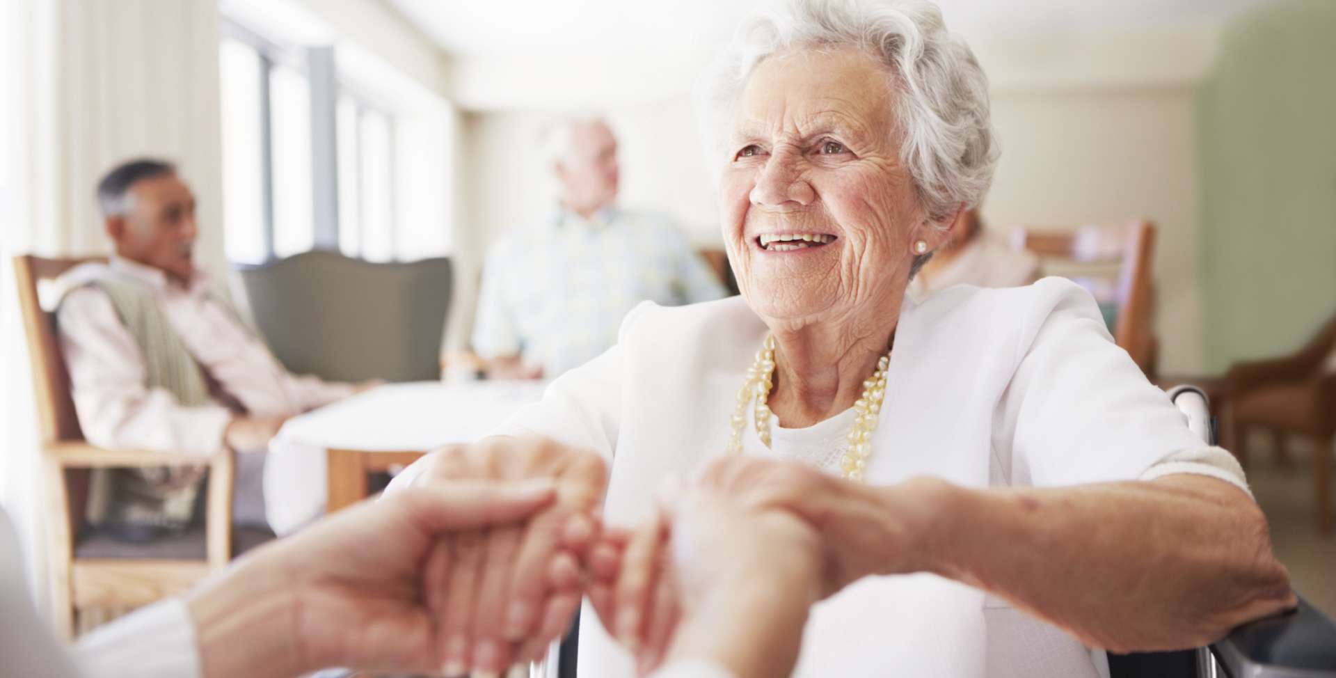 Elderly lady being guided