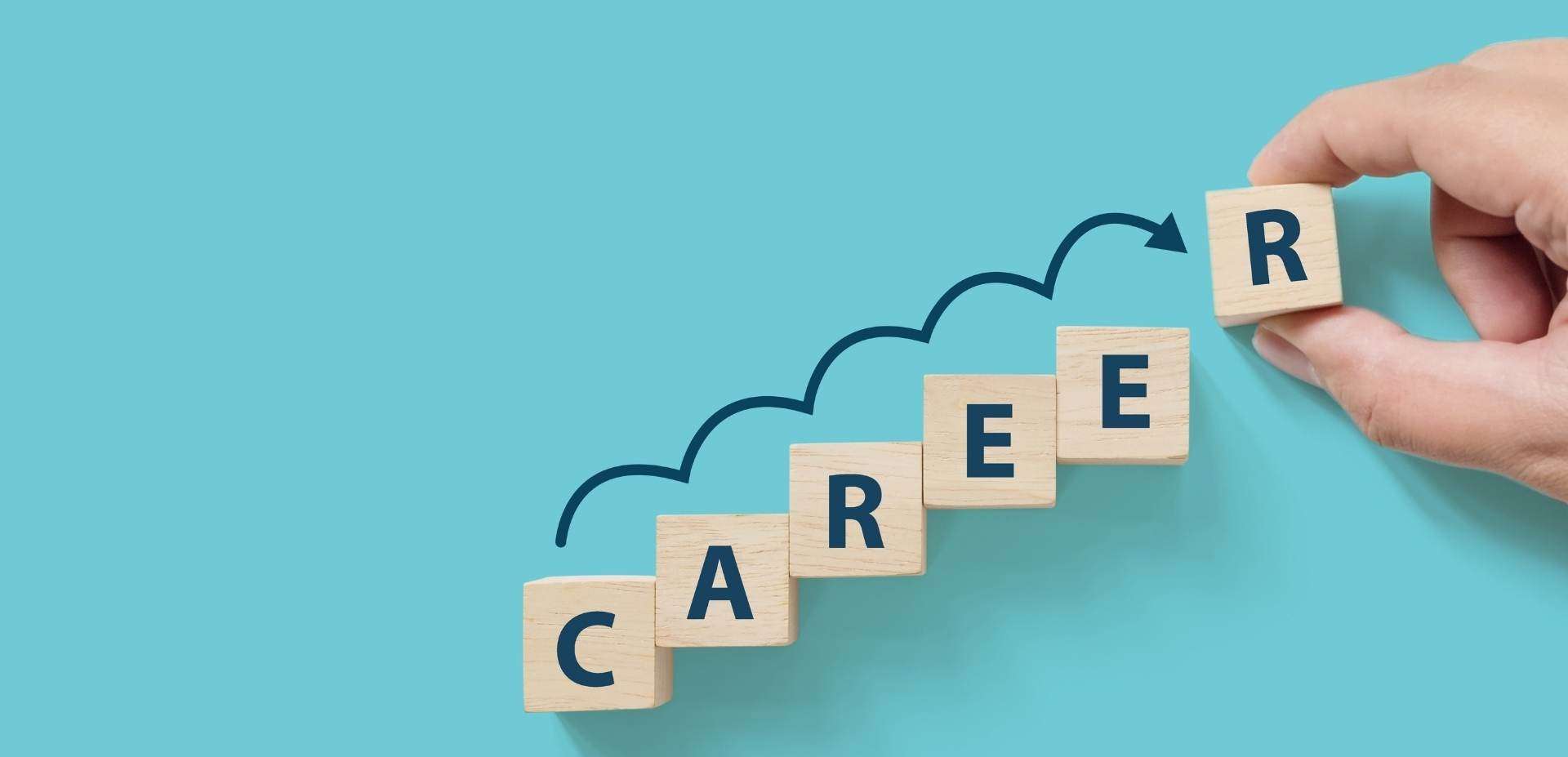 wooden blocks spelling out careers on a duck egg blue background.